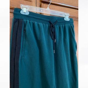 Green and black zipper detailed sweatpants
